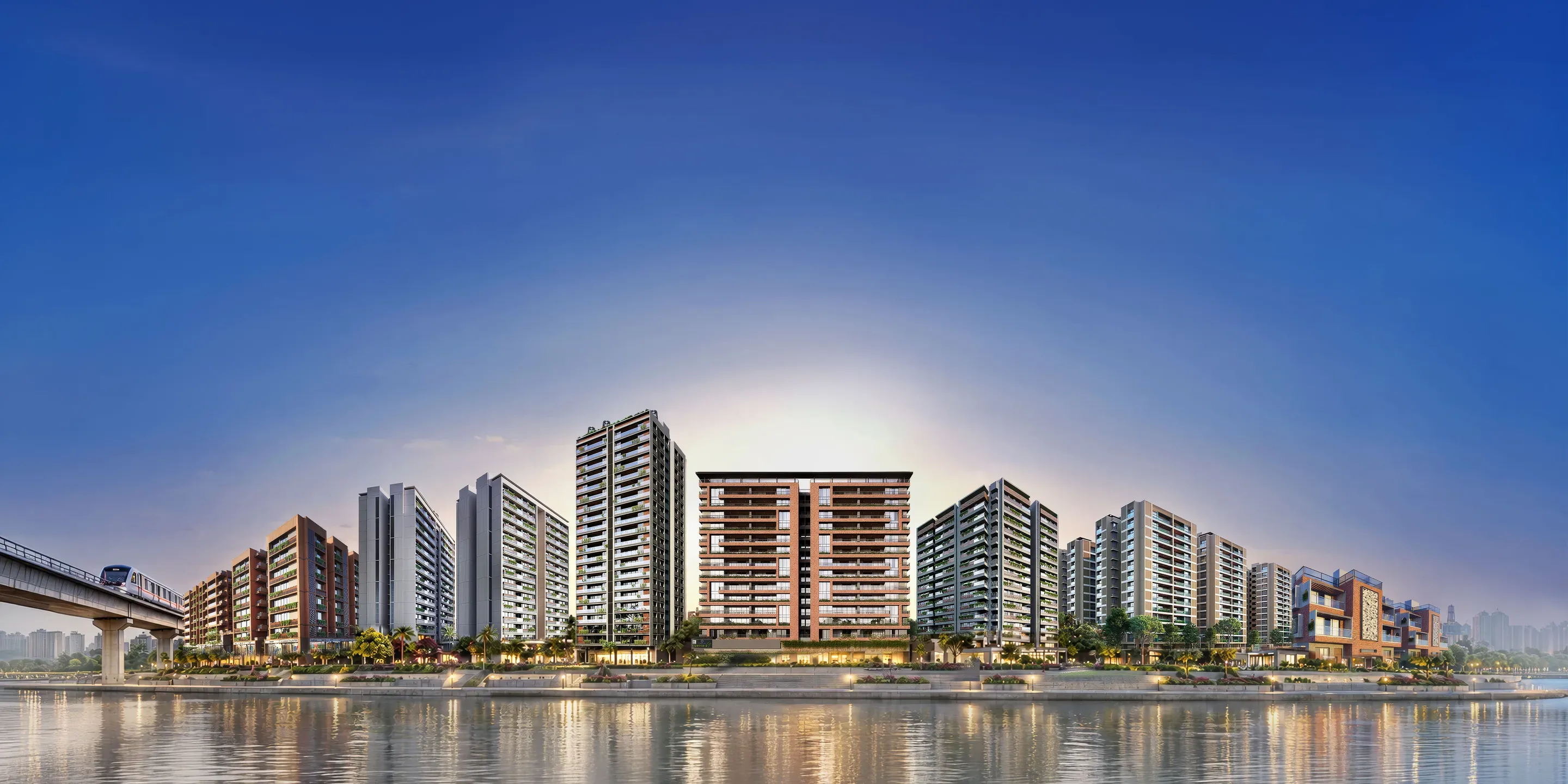 Rivanta residential towers along the Gandhinagar riverfront at dusk